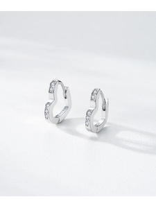 Close-up of S925 sterling silver heart earrings with micro-pave cubic zirconia stones