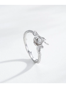 Close-up of S925 sterling silver rose ring with vine texture and sparkling zircon