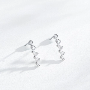 Silver wavy spiral earrings with micro-inlaid rectangular zircons and round stud tops