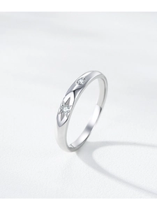Macro shot of S925 sterling silver star ring featuring sparkling micro-set diamonds