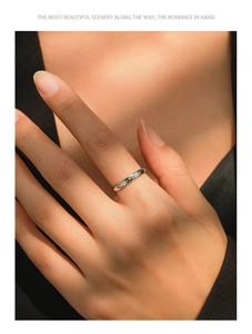 Detailed view of S925 sterling silver star ring with micro-pave cubic zirconia on finger