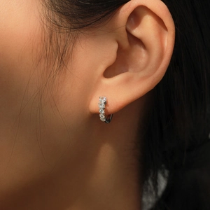 Elegant S925 sterling silver hoop earrings featuring five radiant round-cut zircon stones
