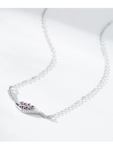 Detail of S925 silver necklace featuring wheat leaf pendant with pink gemstones