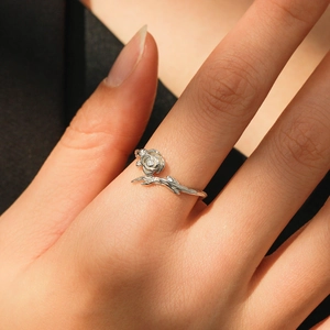 S925 sterling silver rose flower ring with diamond accent on model finger