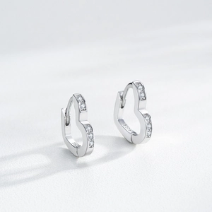 Elegant S925 sterling silver heart-shaped hoop earrings with sparkling pavé cubic zirconia