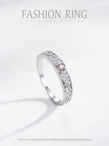 Detail of S925 silver ring featuring pink heart stone and hollow honeycomb design