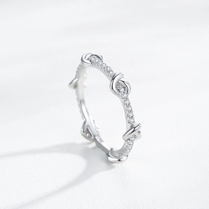S925 sterling silver heart knot ring with micro-pave cubic zirconia crystals for women