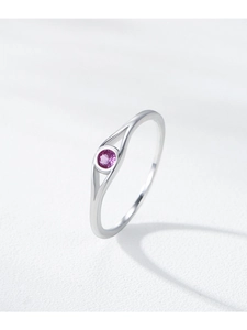 Macro shot of S925 silver ring featuring a round purple gemstone in a hollow geometric setting