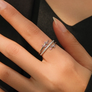 S925 sterling silver leaf ring with pink gems and pavé white zircons on model finger