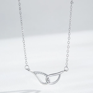 Elegant S925 sterling silver Mobius wing necklace with sparkling micro-pave zirconia crystals