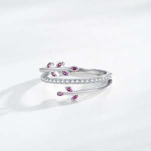 S925 sterling silver leaf open ring with pink gems and white diamonds on white surface