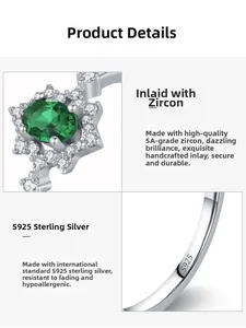 Detail of S925 sterling silver ring featuring oval green zircon and 5A cubic zirconia