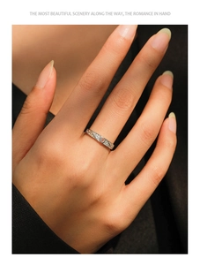 Close-up of S925 silver vintage champagne heart ring with micro-set diamonds on hand