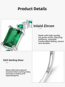 Macro detail showing S925 sterling silver hallmark and emerald-cut green zircon inlay