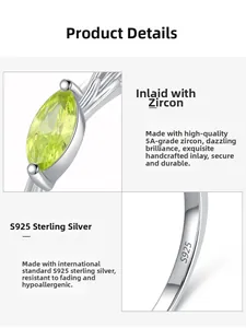 Macro detail of leaf-shaped silver ring with olive green marquise stone and S925 hallmark