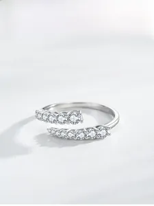 Close-up of S925 sterling silver bypass ring with sparkling pavé cubic zirconia