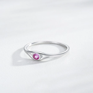 Minimalist S925 sterling silver ring featuring a round pink gemstone in a modern eye setting