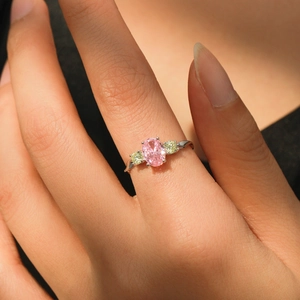 Elegant S925 silver ring featuring an oval pink center stone and yellow side accents