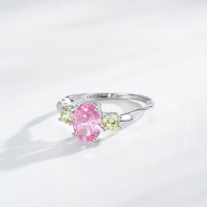 Elegant S925 silver ring featuring a pink oval gemstone and side yellow accent stones