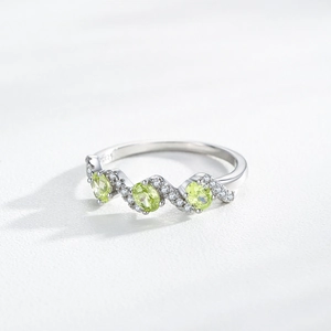 S925 sterling silver ring featuring three oval green zircons in a wave design