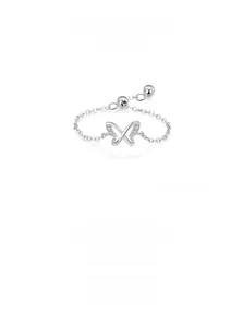 Macro detail of S925 silver butterfly ring with cubic zirconia and adjustable chain