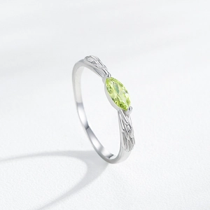 S925 sterling silver ring with marquise-cut apple green stone and leaf relief