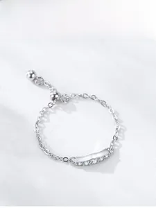 Detail of adjustable 925 sterling silver chain ring with five sparkling zircons and bead clasp