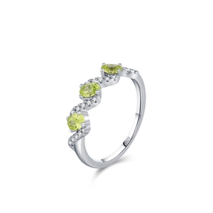 S925 sterling silver wave ring featuring three green zircon stones and tiny diamonds