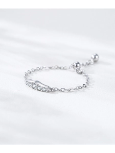 Close-up of adjustable 925 silver chain ring with five sparkling zircon stones