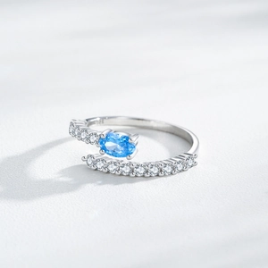 S925 Sterling Silver adjustable ring featuring an oval blue gemstone and zircon accents
