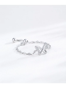 Detail of S925 sterling silver butterfly ring with cubic zirconia on adjustable chain