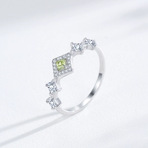 S925 silver ring featuring a light green square zircon with crown-style halo detailing