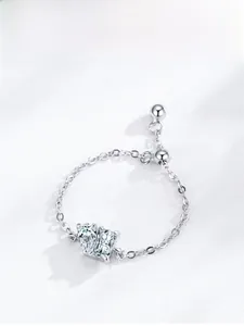 Detail of S925 silver adjustable chain ring with sparkling rectangular sugar cube zircons