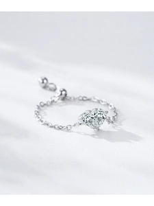 Macro shot of S925 silver heart shaped zircon ring with adjustable pull chain design