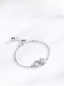 Detail view of S925 silver star and moon chain ring with sparkling zircon inlays