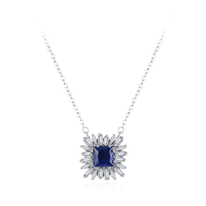 Collier en argent 925 avec pendentif fleur en pierre bleue et halo de rayons solaires