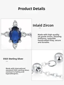 Close-up of 925 sterling silver ring featuring an oval blue zircon and S925 hallmark