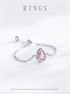 Detail view of the adjustable S925 silver chain ring with a pink teardrop zircon stone