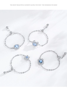 Détail du lot de bagues gourmettes en argent S925 avec zircons bleus et charmes étoiles