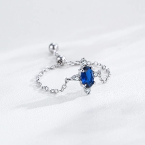 Vintage 925 sterling silver adjustable chain ring with oval sapphire and diamonds