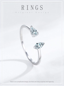 Macro view of adjustable S925 sterling silver ring with pear-cut zircon stones