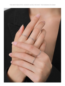 Detail view of 4-piece S925 sterling silver minimalist rings worn on hands