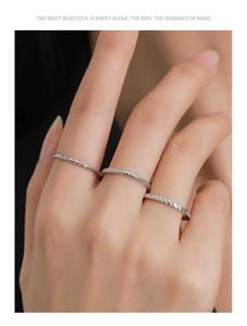 Nahaufnahme von drei S925 Sterlingsilber Ringen mit Pfeil- und Seilstruktur-Design