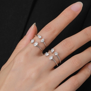 Adjustable S925 sterling silver ring set featuring pear and emerald cut cubic zirconia