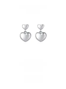 Detail of minimalist S925 sterling silver double heart dangle earrings on white background