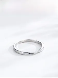 Close-up of S925 sterling silver stamp on minimalist bamboo-style ring band