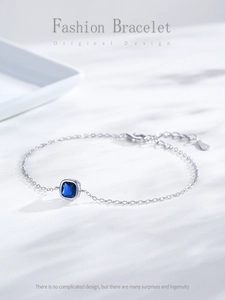 Detail of S925 sterling silver chain with square blue crystal and adjustable clasp