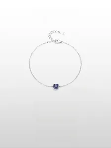 Macro detail of S925 sterling silver chain with square blue gemstone and adjustable clasp