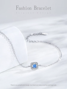 Detail of S925 sterling silver bracelet featuring a blue square zircon pendant and clasp