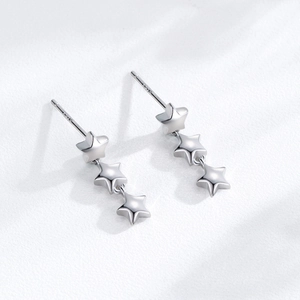 Minimalist 925 sterling silver stud earrings featuring three descending size stars